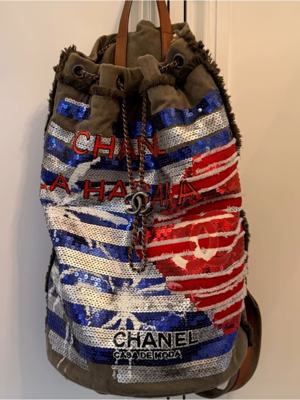CHANEL Sequined Drawstring Backpack in Red, Blue, White